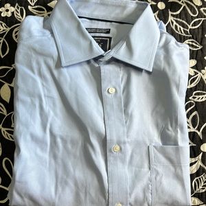 Mens long sleeve dress shirt by Jos A Bank. Size 16-34. Light Blue